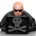 Hacker with laptop.