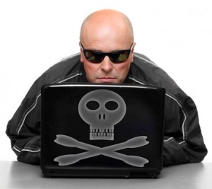 Hacker with laptop.